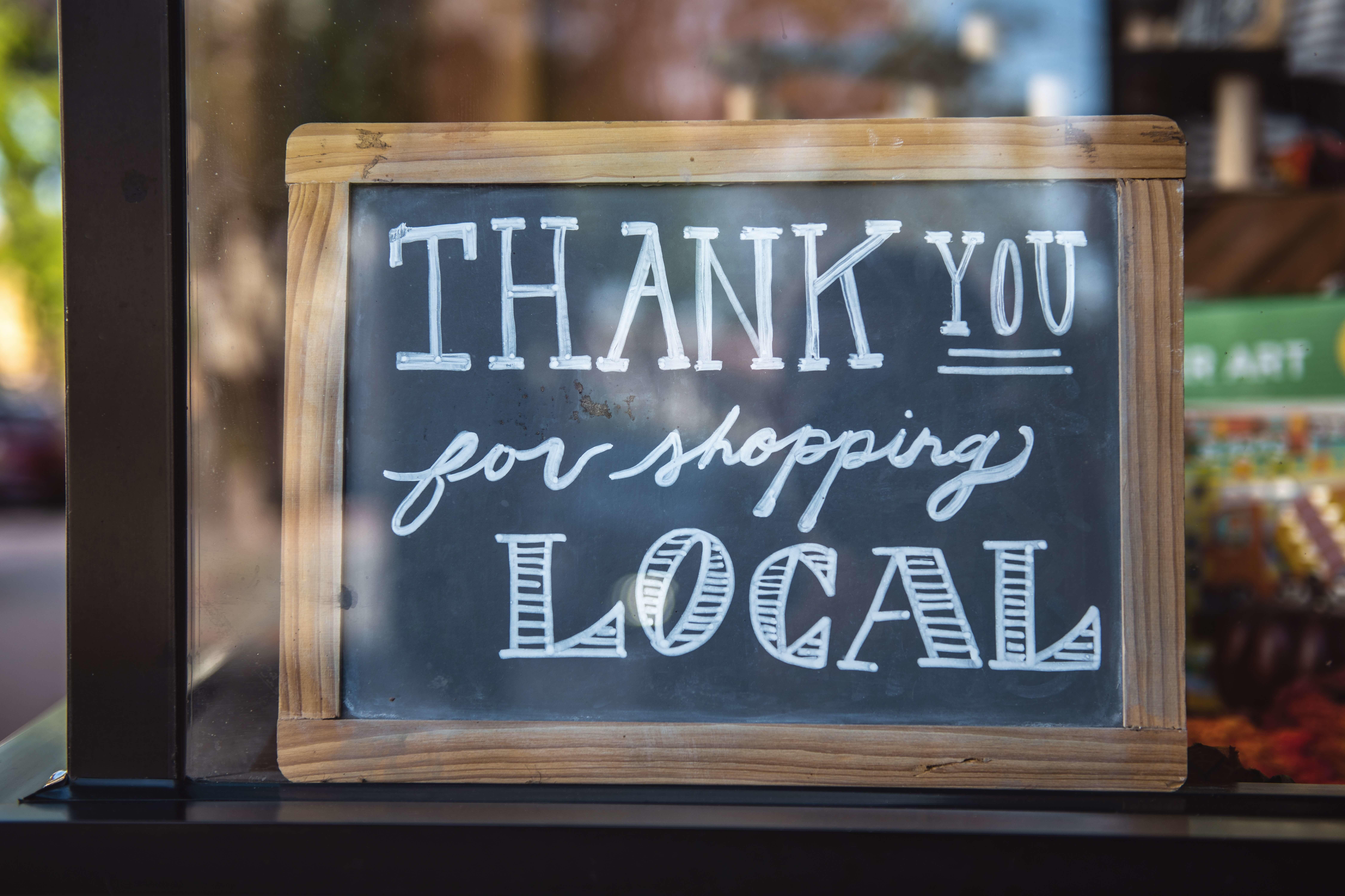 Chalkboard reading: Thank you for shopping local